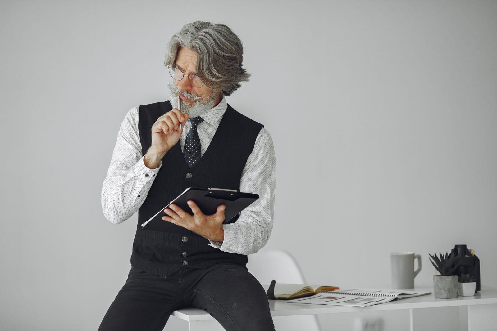 Professional businessman working at his desk in a modern office
