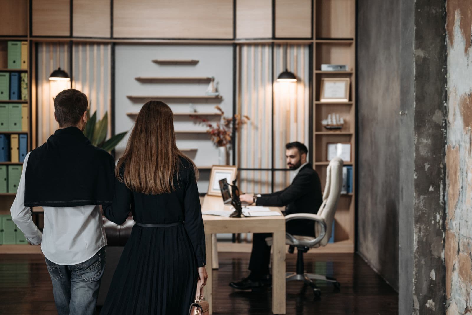 Contemporary law firm reception and workspace with warm professional lighting